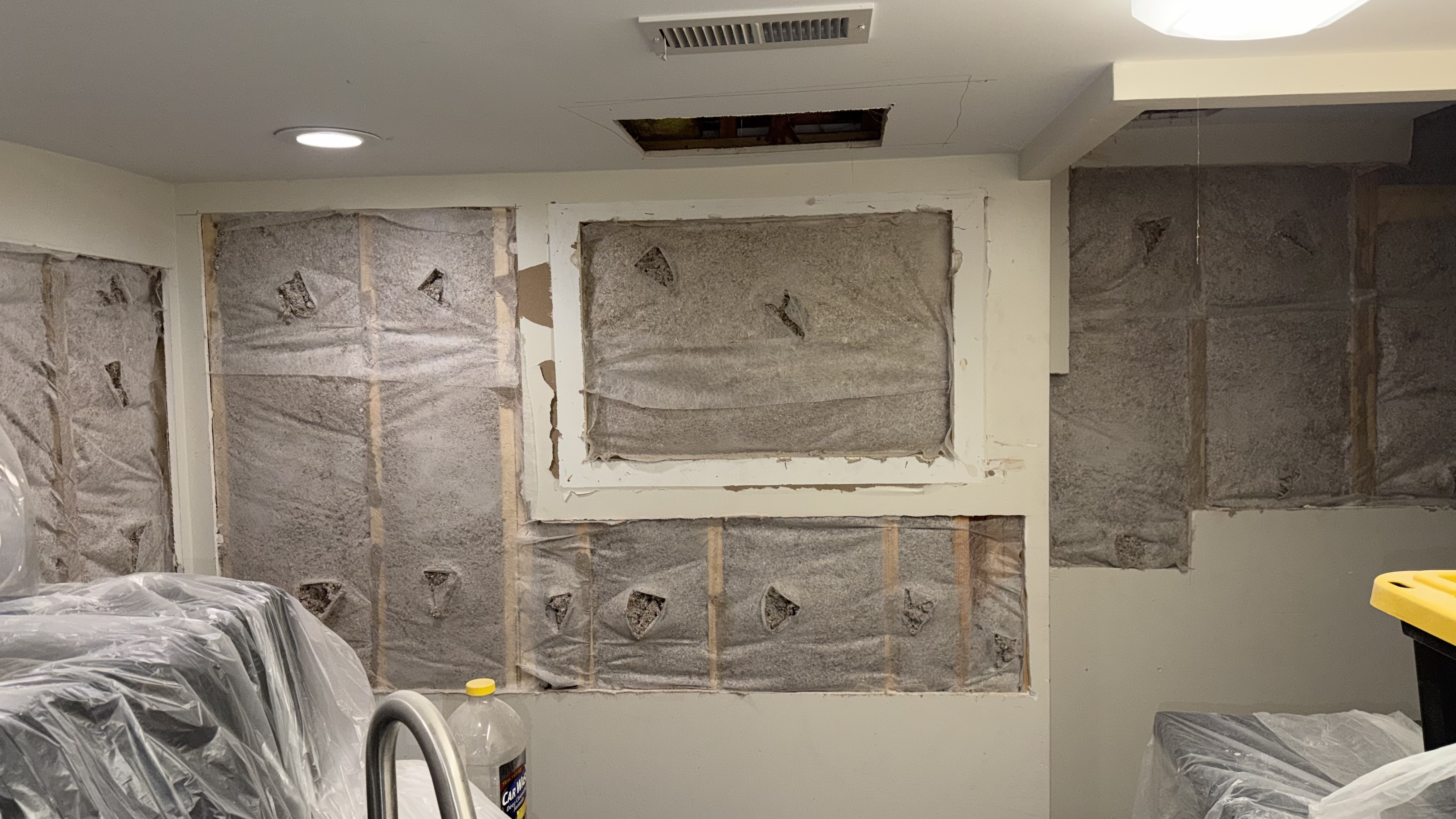 Basement renovation in-wall cellulose insulation